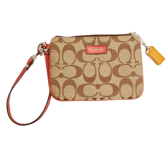 Coach Handbags - Coach Signature Tan with Orange Trim Wristlet